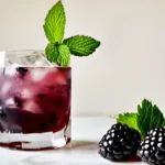 Refreshing Blackberry Smash Cocktail with fresh blackberries and mint.